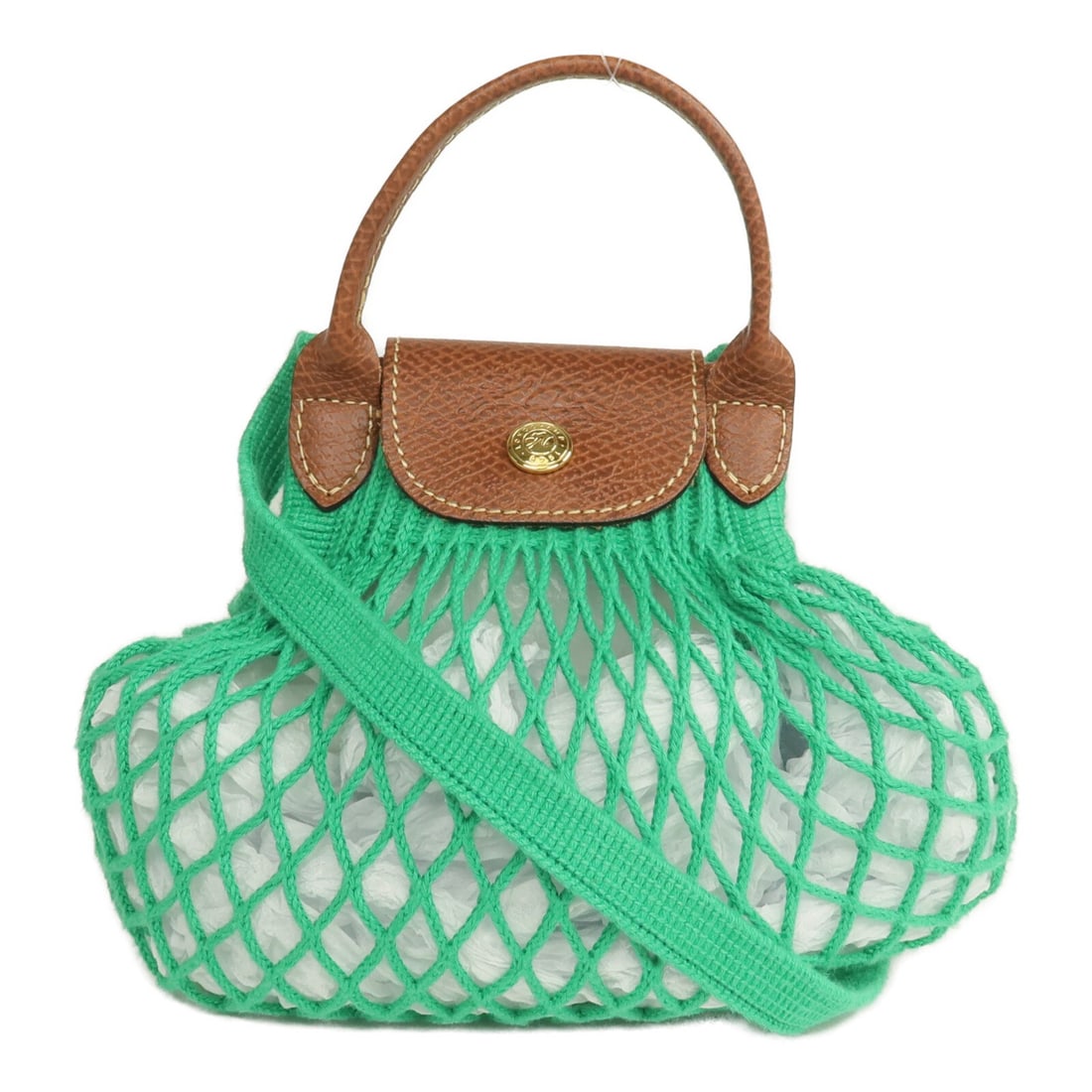 Longchamp Le Pliage Filet Cotton Green 2 Way Shoulder Bag GHW XS: Longchamp Le Pliage Filet Cotton Green 2 Way Shoulder Bag GHW XS This Longchamp XS Le Pliage Filet 2-way shoulder bag features a stylish green cotton exterior with brown leather accents and gold tone 