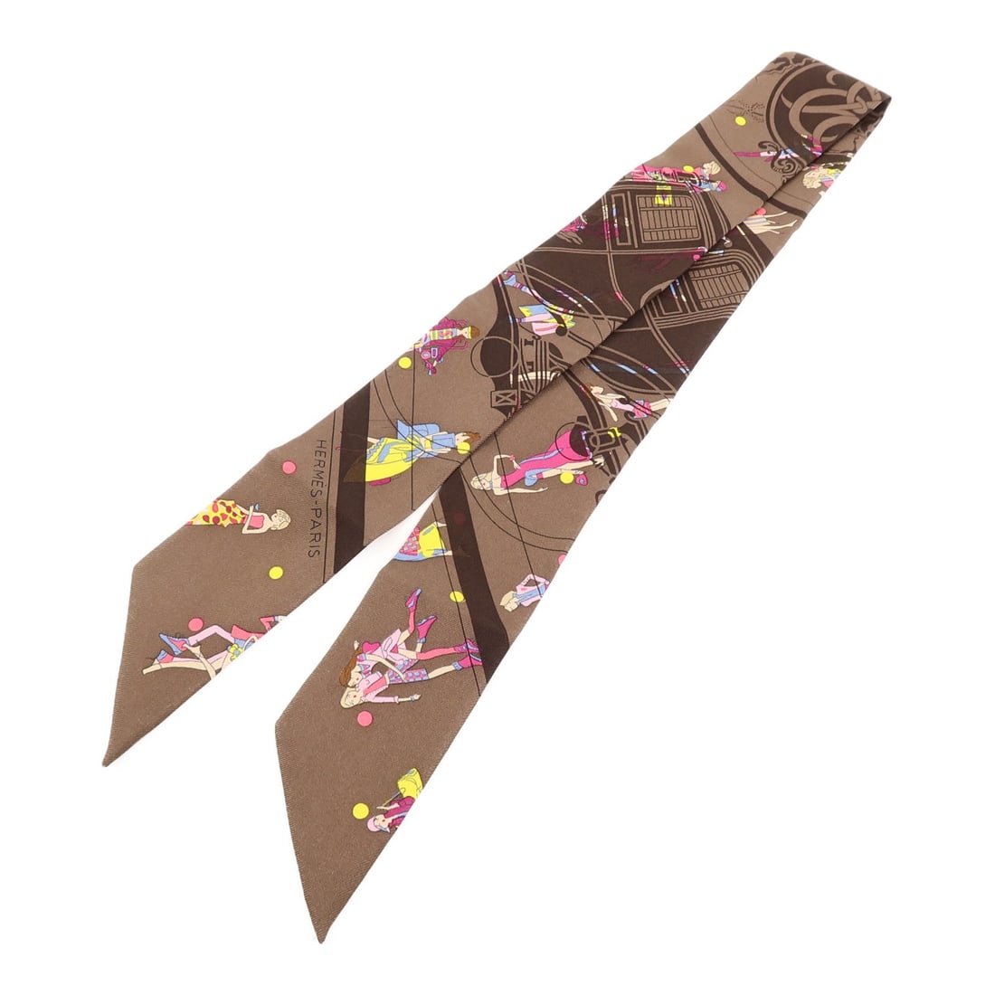 HERMES Twilly silk scarf Brown Pink Yellow: HERMES Twilly silk scarf Brown Pink Yellow This Hermes Twilly scarf is crafted from luxurious silk and features a striking combination of brown, pink, and yellow tones. Designed for women, this elegan