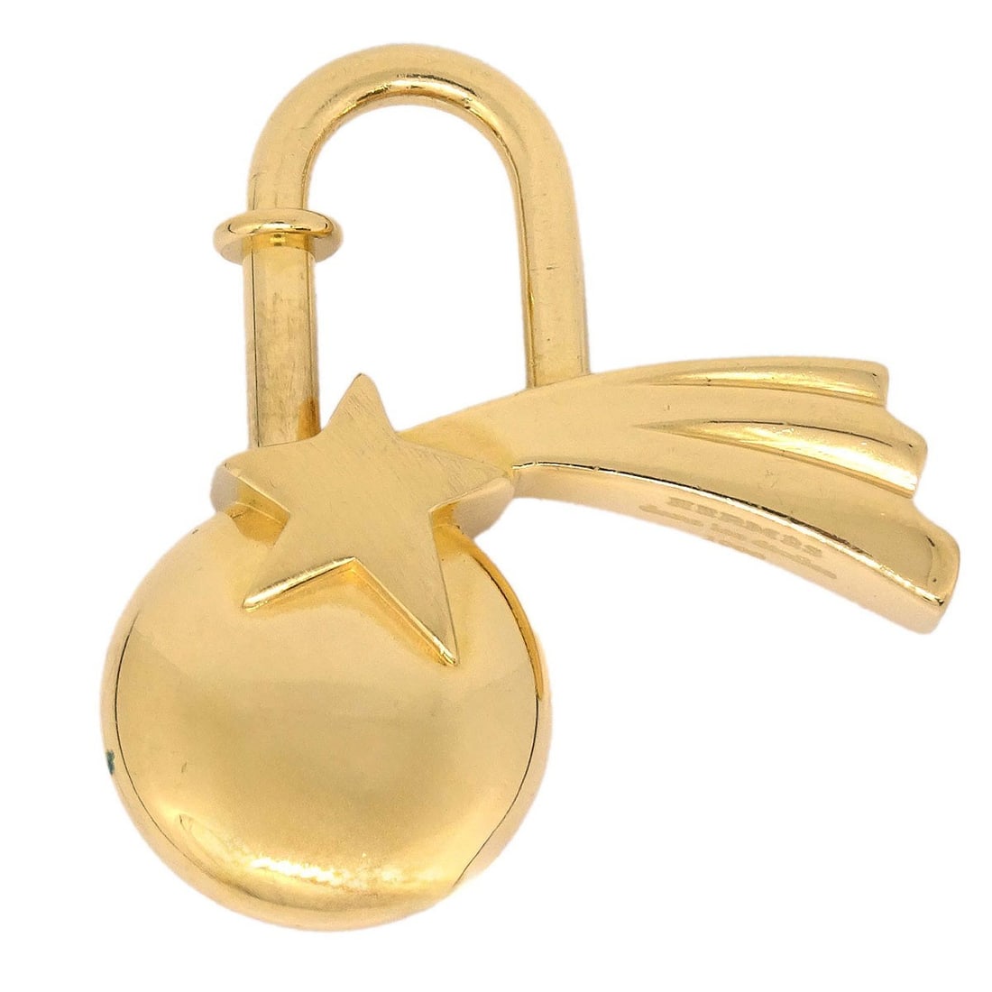 Hermes Shooting Star Cadena Gold Charm 1999 Small: Hermes Shooting Star Cadena Gold Charm 1999 Small This is a vintage Hermes Shooting Star Cadena charm from 1999, crafted in a gold tone. Designed for unisex use, it features a metal shooting star moti