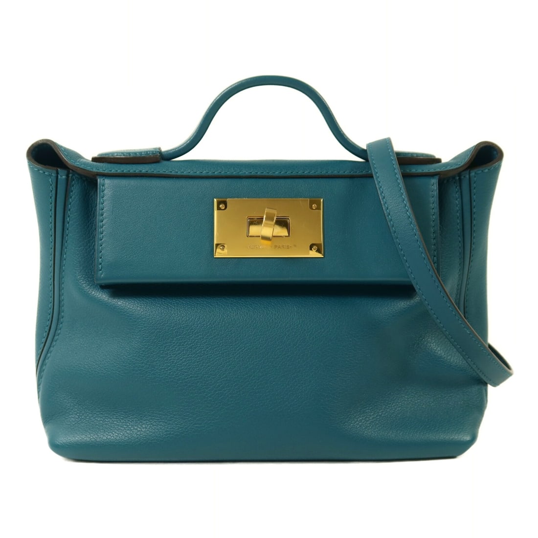 Hermes 24 24 Mini Evercolor Leather Blue 2 Way Shoulder Bag GHW: Hermes 24 24 Mini Evercolor Leather Blue 2 Way Shoulder Bag GHW This Hermes 24/24 Mini 2 Way Shoulder Bag is crafted from Evercolor calfskin leather in Vert Bosphore (blue). Designed for versatility, 