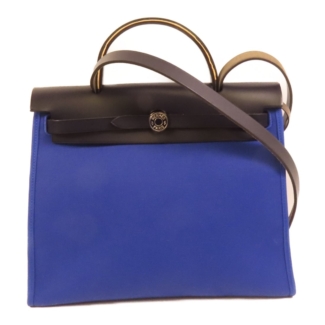 Hermes Herbag PM Blue Canvas 2Way Shoulder Bag with Palladium Hardware: Hermes Herbag PM Blue Canvas 2Way Shoulder Bag with Palladium Hardware This Hermes Herbag PM 2Way shoulder bag features a blue canvas exterior and offers versatile wear options. Crafted in France, it 