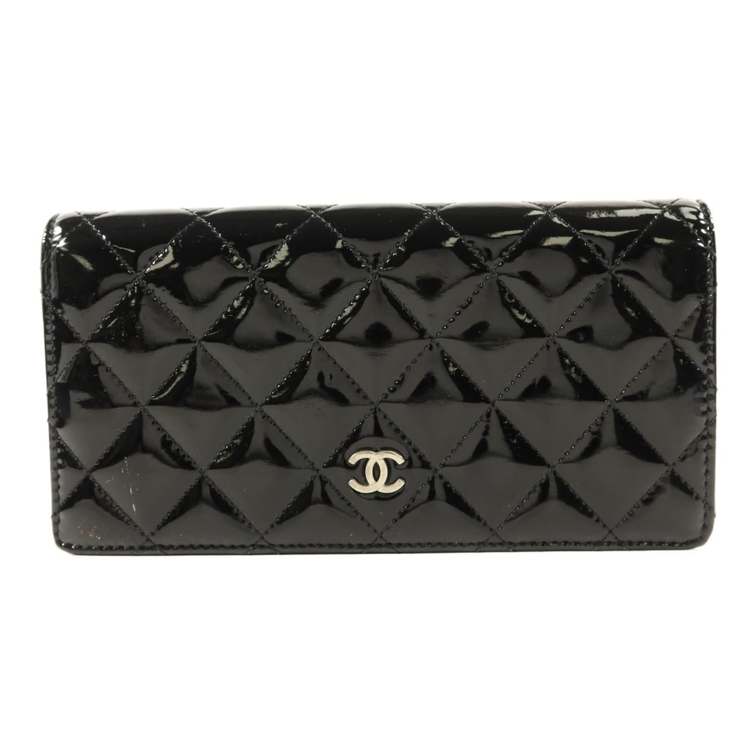 Black Patent Leather Bifold Wallet with Silver CC Logo by Chanel: Black Patent Leather Bifold Wallet with Silver CC Logo by Chanel This CHANEL long bifold wallet for women is crafted from black patent leather and features a classic CC design with silver-tone hardwar