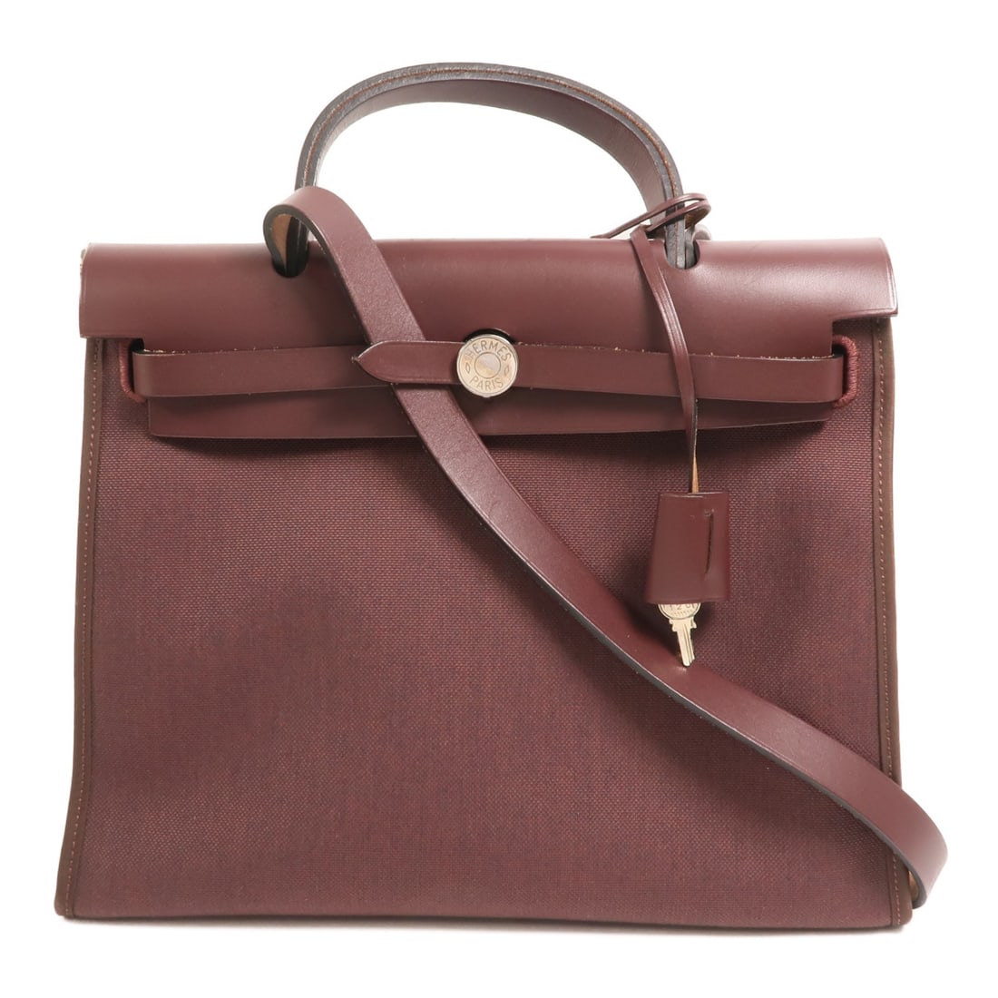 Hermes Herbag PM Toile Canvas Red 2 Way Shoulder Bag: Hermes Herbag PM Toile Canvas Red 2 Way Shoulder Bag This Hermes Herbag PM is a versatile 2-way shoulder bag crafted from durable red canvas. Designed for women, it features a classic silhouette with 