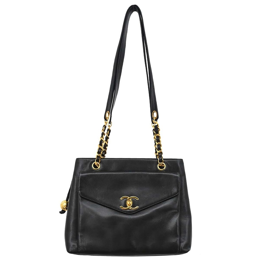 CHANEL Black Lambskin Hand Tote Bag: CHANEL Black Lambskin Hand Tote Bag This Chanel shoulder tote bag is crafted from black lambskin leather and features the iconic logo accent. Designed with a medium size, it includes a zipper closure,