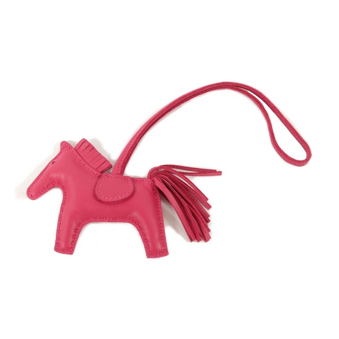 Hermes Rodeo PM Pink Milo Leather Charm: Hermes Rodeo PM Pink Milo Leather Charm This Hermes Rodeo PM Charm is crafted from high-quality lambskin leather in a pink Rose Mexico color. Designed for women, it features a regular size and is made