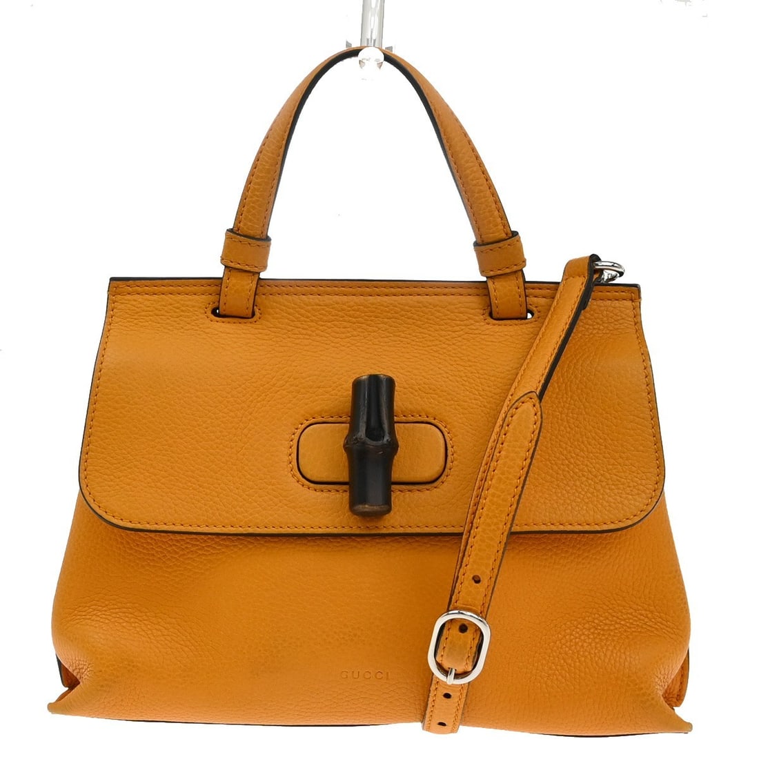 Gucci Leather Bamboo Daily Orange Top Handle Bag: Gucci Leather Bamboo Daily Orange Top Handle Bag This Gucci Bamboo Daily Top Handle Bag for women features vibrant orange leather with a structured silhouette. Made in Italy, it offers a spacious inte
