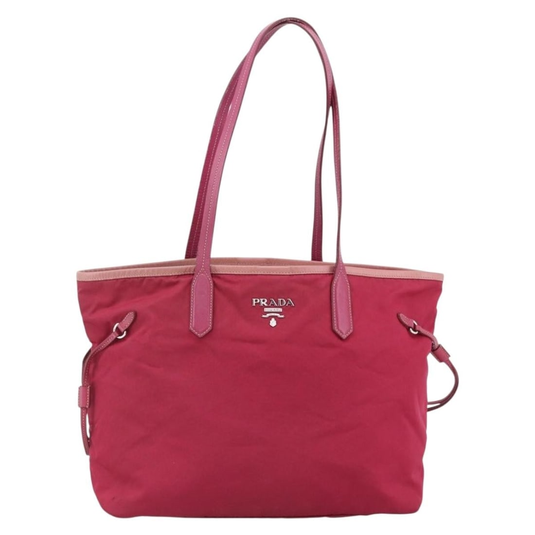 Pink Nylon Tote Bag by Prada Vintage Collection: Pink Nylon Tote Bag by Prada Vintage Collection This Prada Vintage Tote is crafted from pink nylon and designed for women. Made in Italy, it features a spacious interior and classic tote silhouette. T