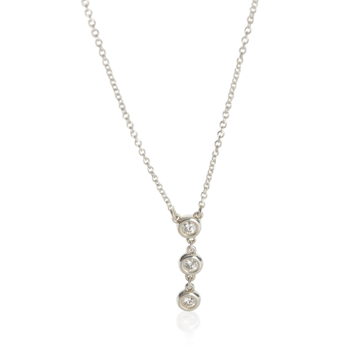 Tiffany Elsa Peretti Diamond By The Yard sterling silver pendant: Tiffany Elsa Peretti Diamond By The Yard sterling silver pendant This pre-owned Tiffany & Co. Elsa Peretti Diamond By The Yard pendant features three round brilliant diamonds with a total carat weight
