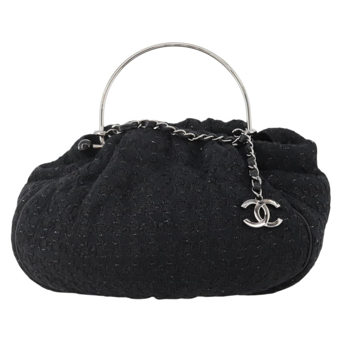Chanel Knitting Satchel Tweed Handbag: Chanel Knitting Satchel Tweed Handbag This Chanel Knitting Satchel is crafted from multicolour tweed, featuring a classic boucle texture. The bag is designed for women and offers spacious interior sto