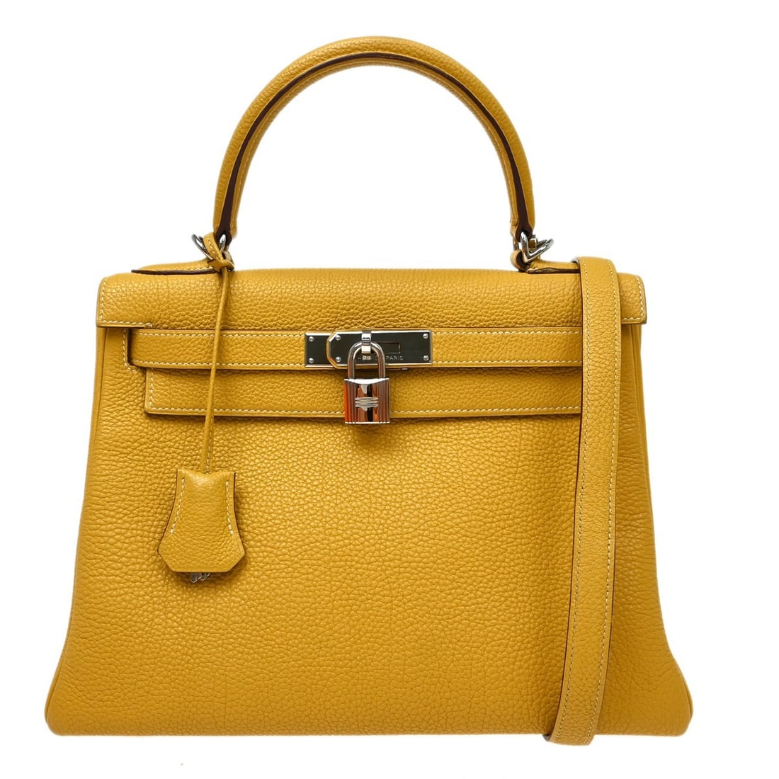 Hermes Kelly 28 Curry Leather Top Handle Bag Gold Hardware: Hermes Kelly 28 Curry Leather Top Handle Bag Gold Hardware This Hermes Kelly 28 Retourne 2-way handbag is crafted from Veau Crispe Togo leather in a striking curry color. It features a medium size wit