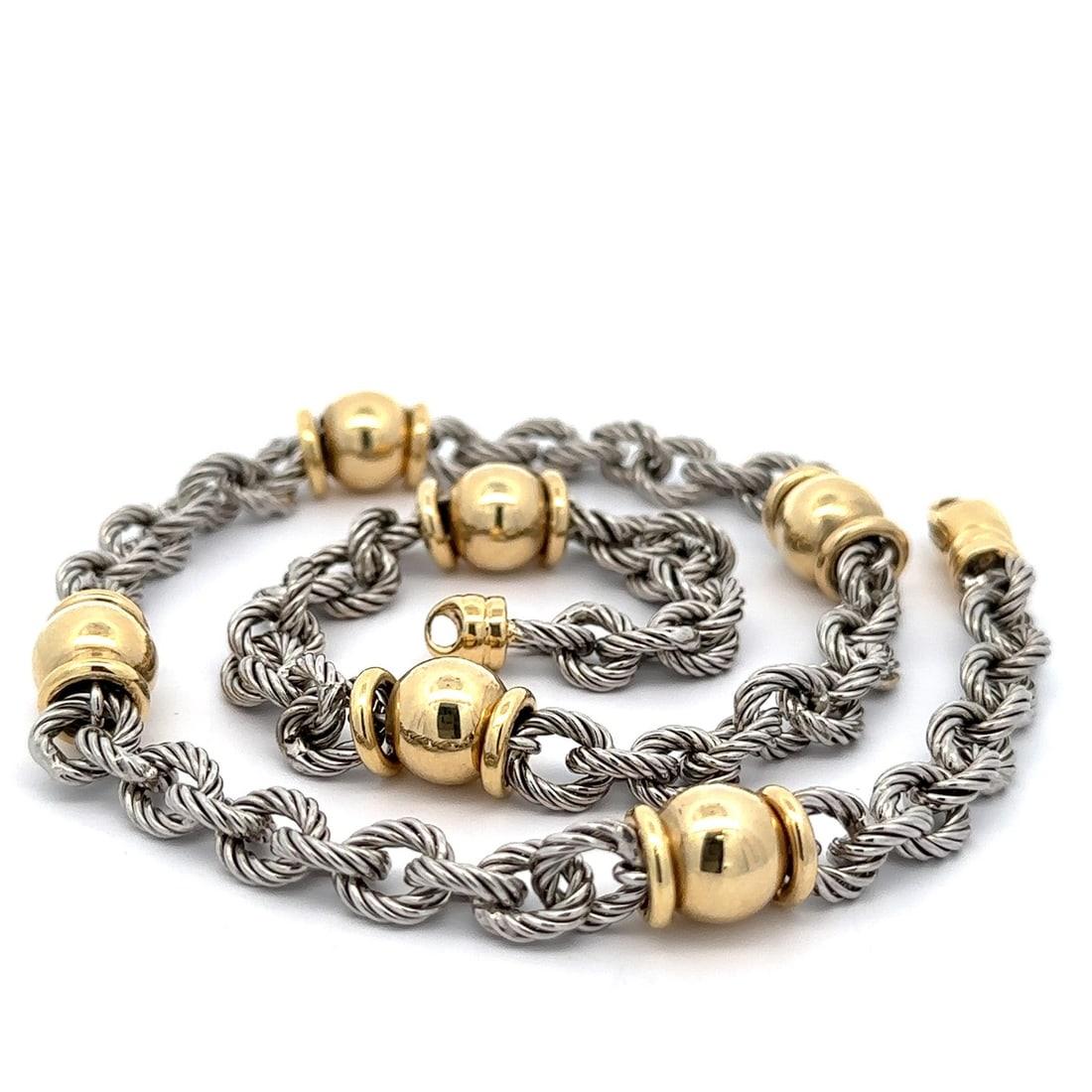 14k Two Tone 18 Inch Twisted Cable Necklace with Polished Sections: 14k Two Tone 18 Inch Twisted Cable Necklace with Polished Sections Enhance your jewelry collection with this exquisite 14k Two Tone Twisted Cable Link Necklace. Crafted from solid 14k yellow and white