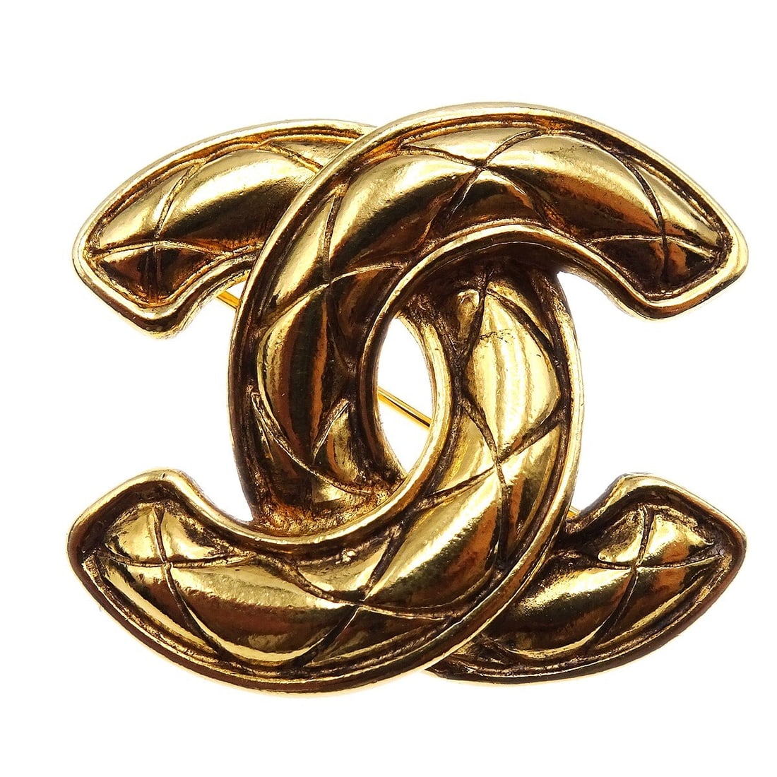 Chanel Gold Quilted CC Logo Brooch Pin 1153: Chanel Gold Quilted CC Logo Brooch Pin 1153 This elegant Chanel Quilted CC Brooch Pin showcases a stunning gold-plated finish with a classic logo design. Perfect for adding a touch of luxury to any ou