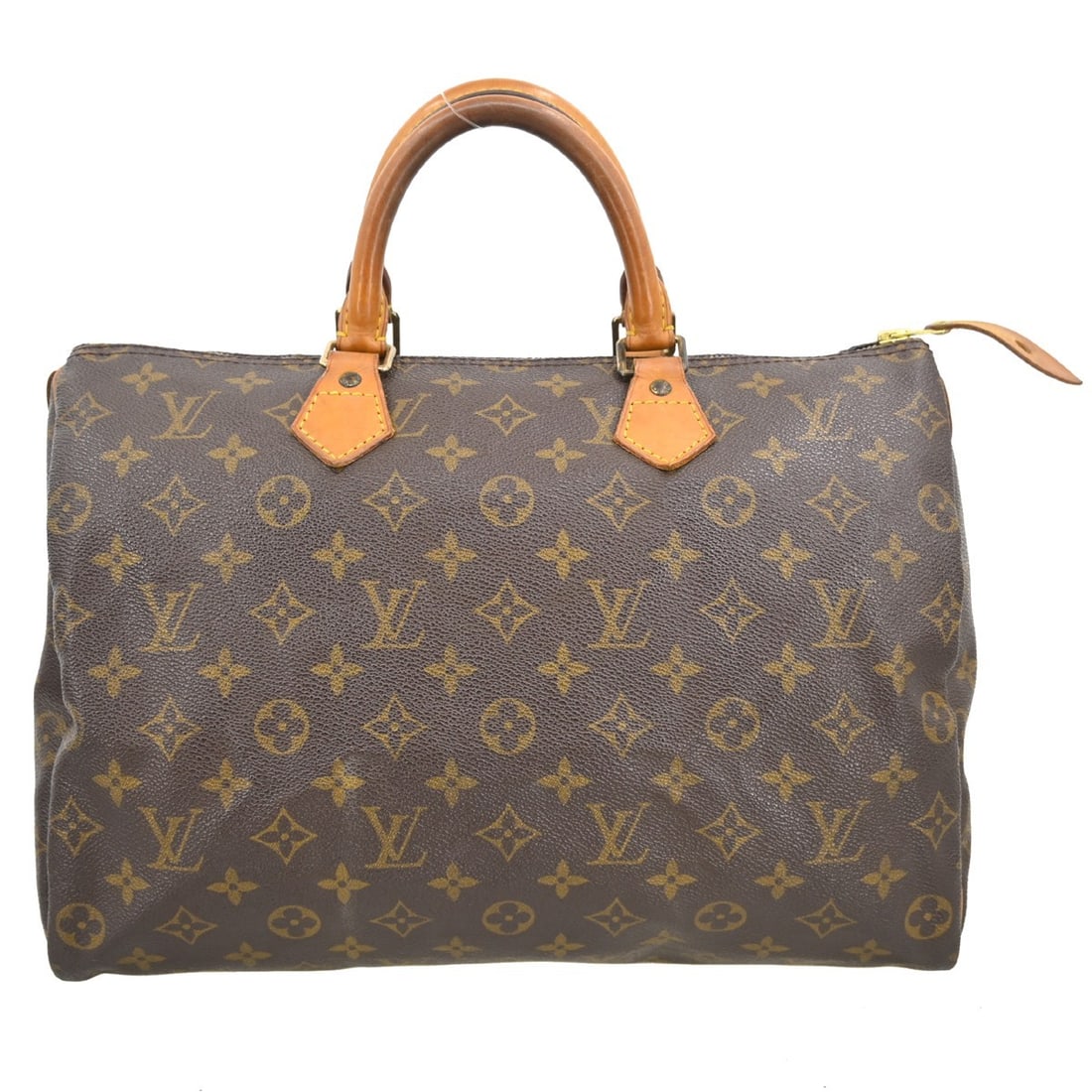 Louis Vuitton Speedy Monogram Canvas Handbag: Louis Vuitton Speedy Monogram Canvas Handbag This Louis Vuitton Speedy handbag features the signature Monogram Canvas in brown. Designed for women, it offers a classic look with durable canvas constru