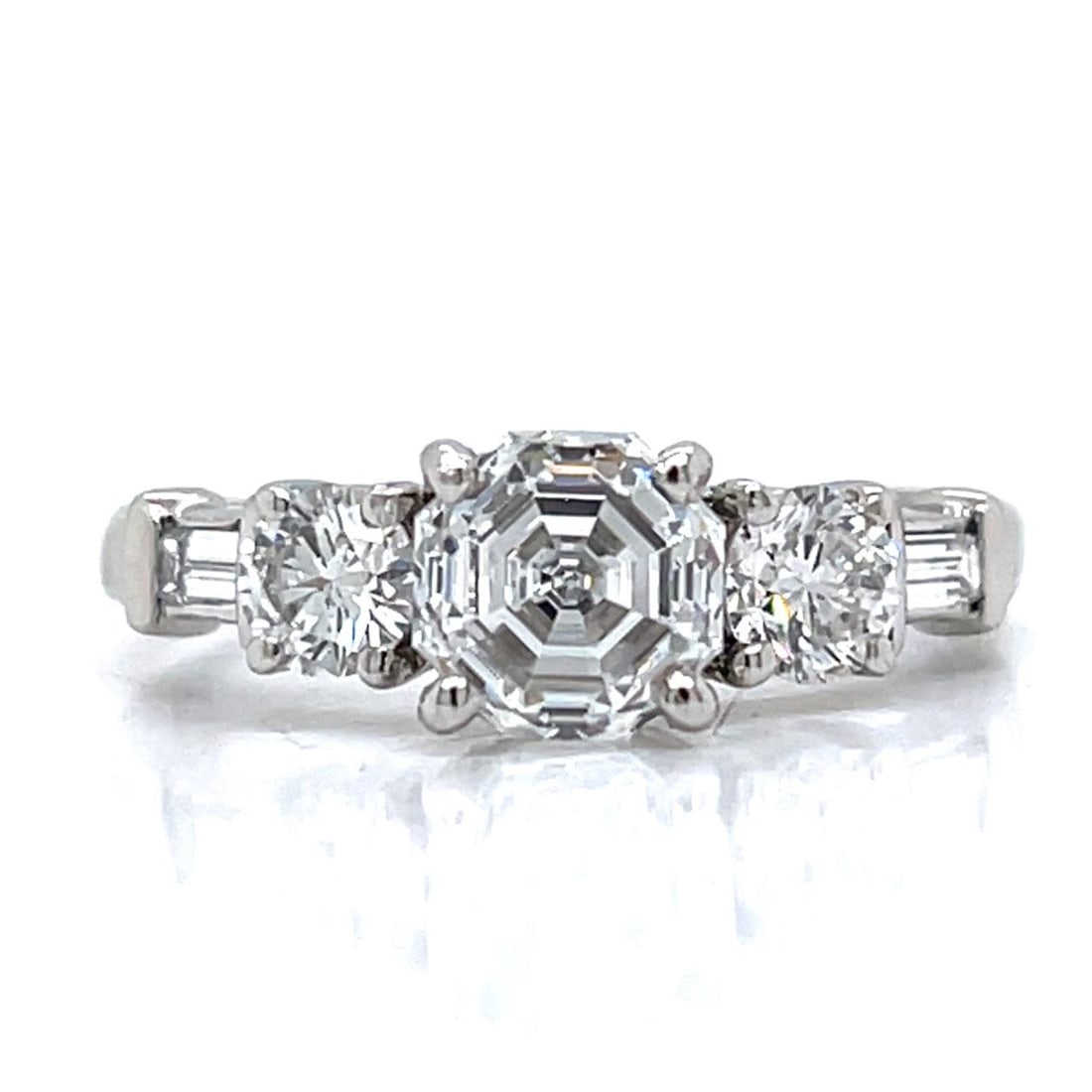 GIA Certified 1.51 Ct Platinum Octagonal Diamond Engagement Ring: GIA Certified 1.51 Ct Platinum Octagonal Diamond Engagement Ring This stunning engagement ring features a GIA Certified 1.51 Ct. octagonal diamond, displaying a D color and VS2 clarity, beautifully se