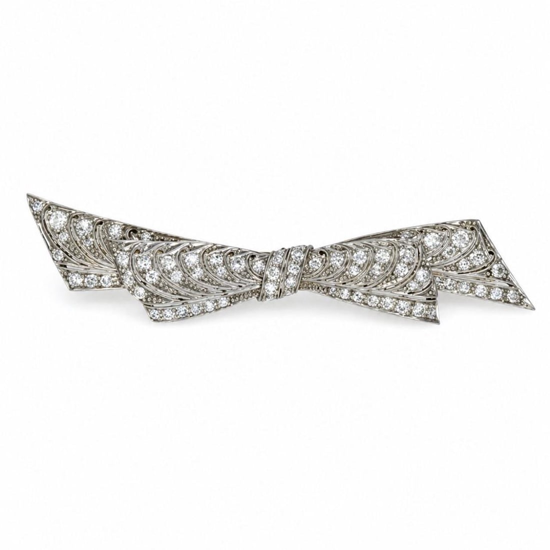 Platinum Art Deco Diamond Bow Pin 68 Stones 2.75 Inch: Platinum Art Deco Diamond Bow Pin 68 Stones 2.75 Inch This Art Deco bow brooch is crafted from platinum and set with 68 European-cut diamonds, totaling approximately 2.00 carats. The diamonds feature 