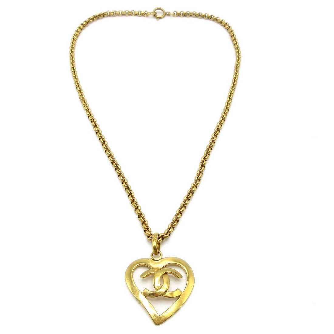 Chanel Vintage Gold-Plated Heart Pendant Necklace 95P: Chanel Vintage Gold-Plated Heart Pendant Necklace 95P Elevate your accessory collection with this vintage Chanel Heart Chain Pendant Necklace. Crafted with a stunning gold-plated finish, this charming