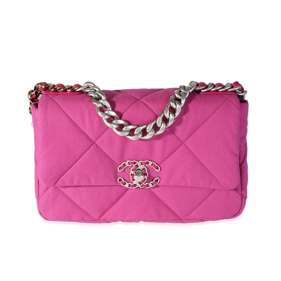 Chanel Medium 19 Pink Quilted Cotton Shoulder Flap Bag with Dustbag: Chanel Medium 19 Pink Quilted Cotton Shoulder Flap Bag with Dustbag This Chanel Medium Chanel 19 Flap Bag features a fuchsia quilted cotton exterior with silver-tone hardware. The unisex shoulder bag 