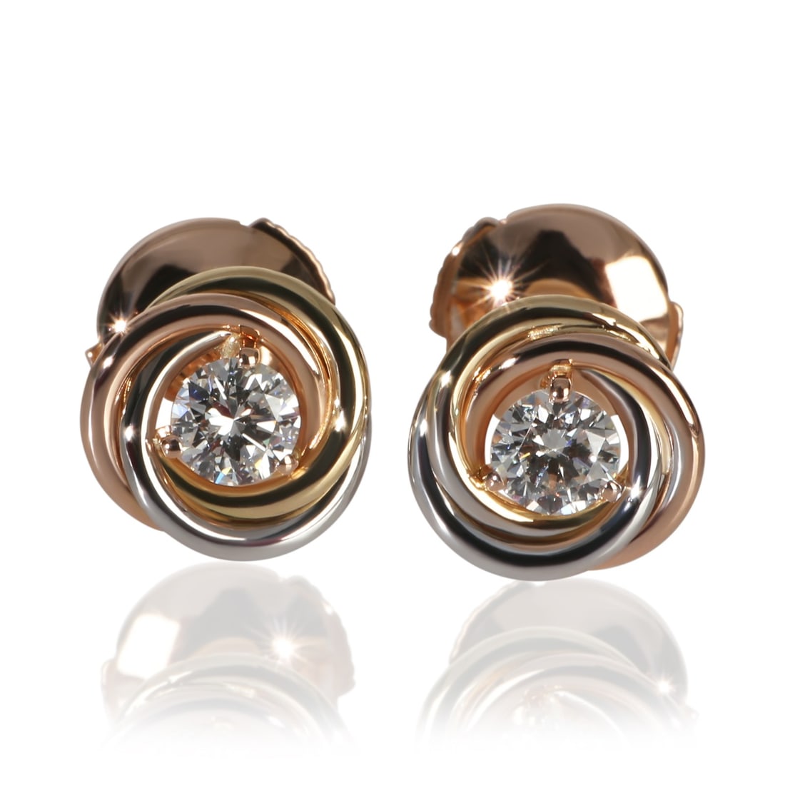 Cartier Trinity Stud Diamond Earrings 18k 3 Tone Gold: Cartier Trinity Stud Diamond Earrings 18k 3 Tone Gold These Cartier Trinity Stud Earrings feature a sophisticated three-tone gold design set with round brilliant white diamonds. Crafted from 18k gold,