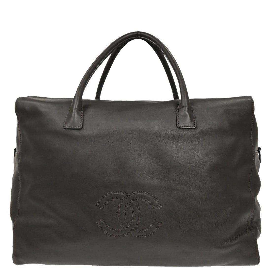 CHANEL Brown Calfskin Duffle Travel Bag: CHANEL Brown Calfskin Duffle Travel Bag This Chanel travel handbag is crafted from brown calfskin leather and designed in a spacious duffle style. Made in Italy, it features an extra-large size, makin