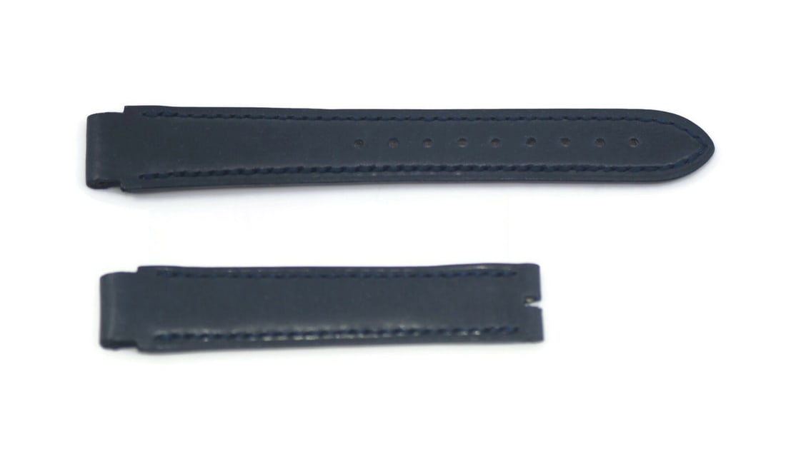 Chopard Authentic Navy Blue Leather Watch Strap 16mm: Chopard Authentic Navy Blue Leather Watch Strap 16mm Enhance your timepiece with this authentic Chopard Navy Blue Leather Strap. Designed specifically for wristwatches, this strap boasts a classic blu