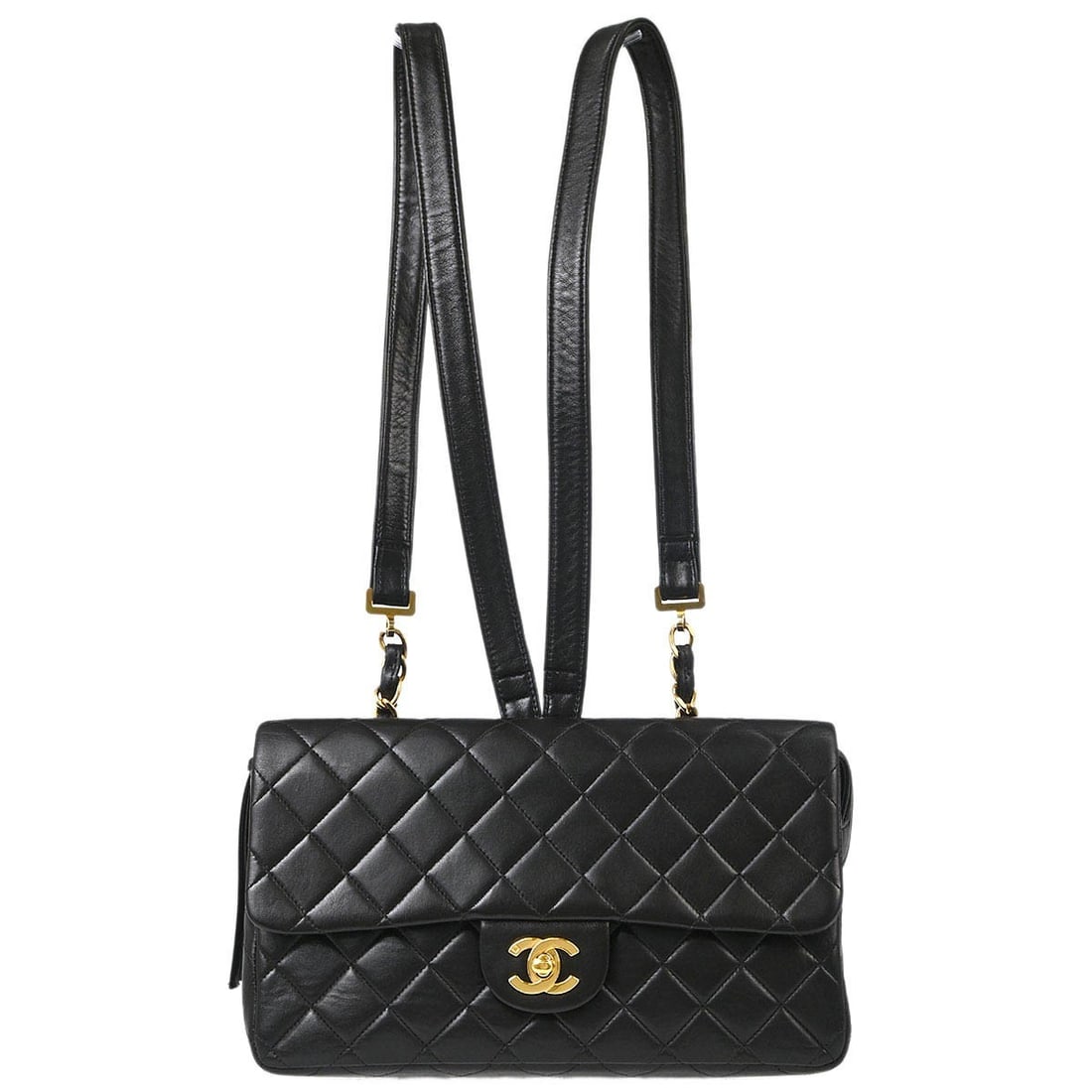 CHANEL Duma Black Lambskin Turn Lock Backpack: CHANEL Duma Black Lambskin Turn Lock Backpack This Chanel Classic Flap Backpack features a sophisticated design crafted from black lambskin leather. The backpack is styled with a turn lock closure and