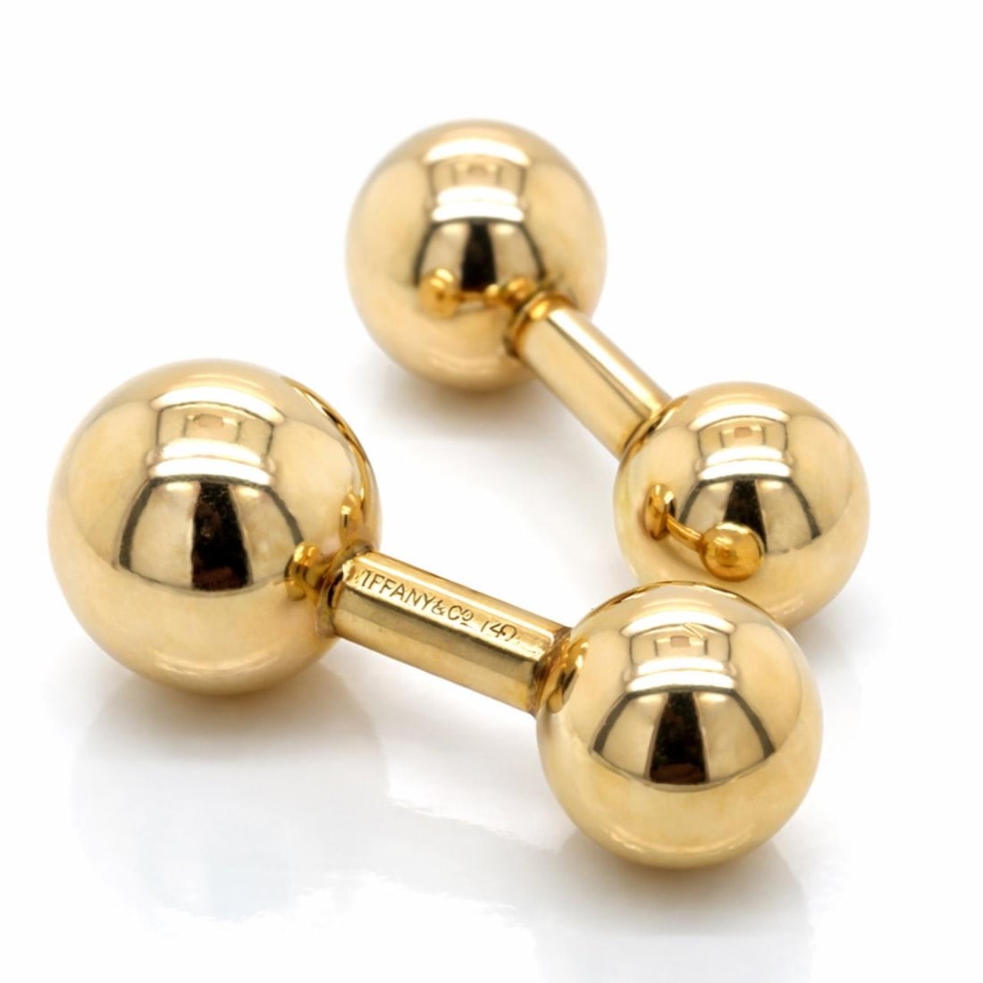 14K Yellow Gold Cufflinks by Tiffany & Co Weigh 9.7 Grams: 14K Yellow Gold Cufflinks by Tiffany & Co Weigh 9.7 Grams These Tiffany & Co. cufflinks are crafted from 14K yellow gold and have a total weight of 9.7 grams. They are offered in pre-owned condition. 
