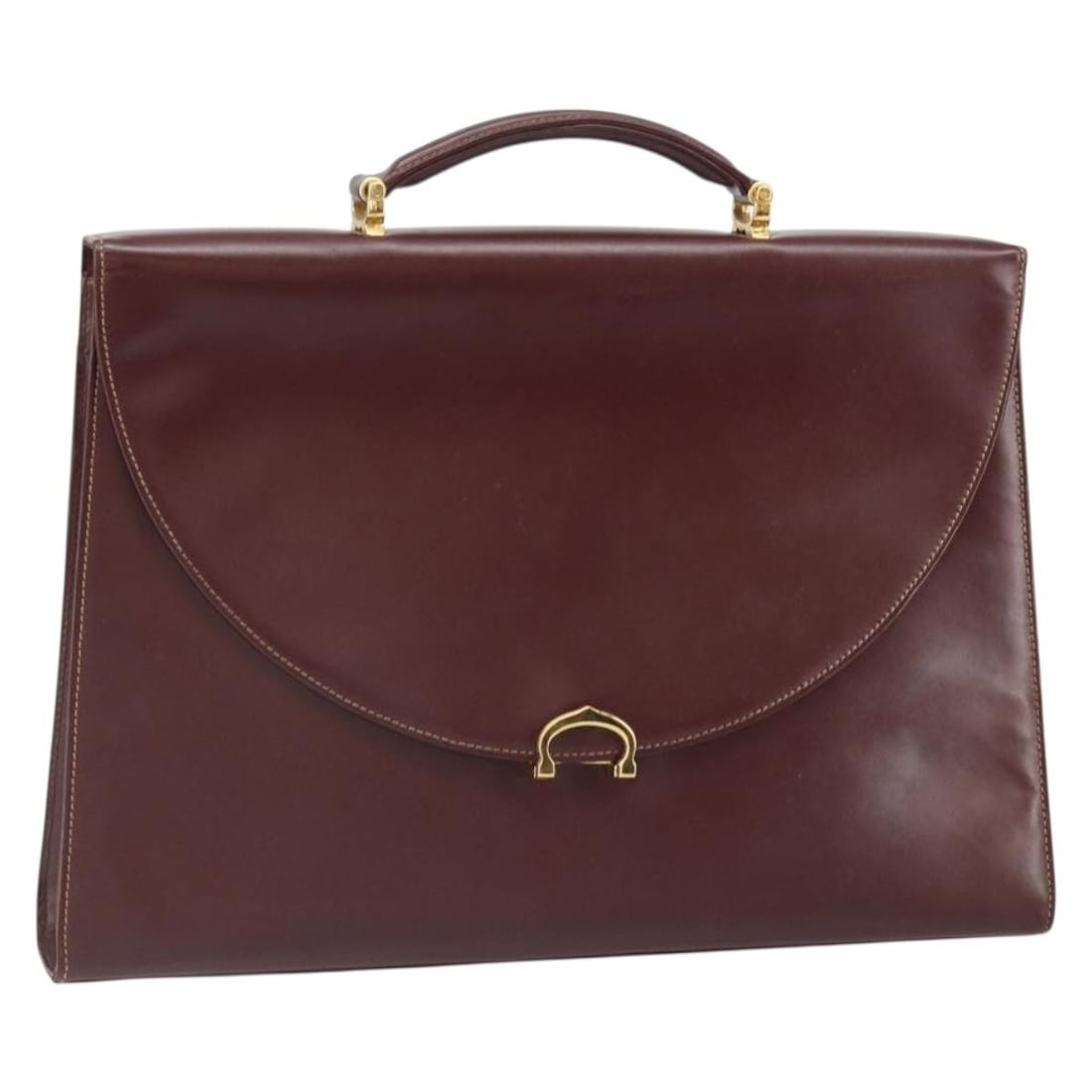 Cartier Must Line Bordeaux Leather Handbag with Gold Tone Accents: Cartier Must Line Bordeaux Leather Handbag with Gold Tone Accents This is a Cartier Must Line hand bag crafted from bordeaux leather with gold-tone accents. The bag features a structured silhouette, d