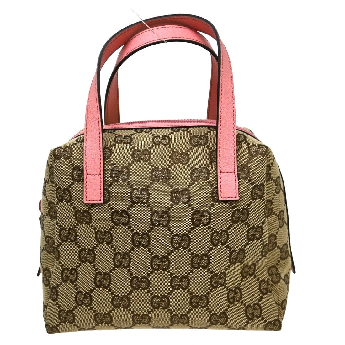Gucci GG brown canvas leather tote handbag: Gucci GG brown canvas leather tote handbag This vintage Gucci tote handbag features the iconic brown GG canvas pattern, complemented by canvas leather accents. Designed in a medium size, it offers pra