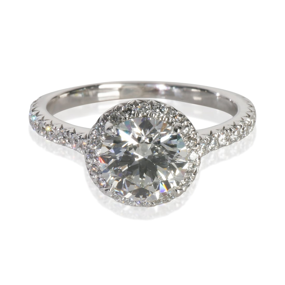 Tiffany Soleste Platinum Diamond Engagement Ring Size 5: Tiffany Soleste Platinum Diamond Engagement Ring Size 5 This Tiffany & Co. Soleste engagement ring features a 1.15 carat round brilliant diamond as the centerpiece, complemented by 0.23 carats of side