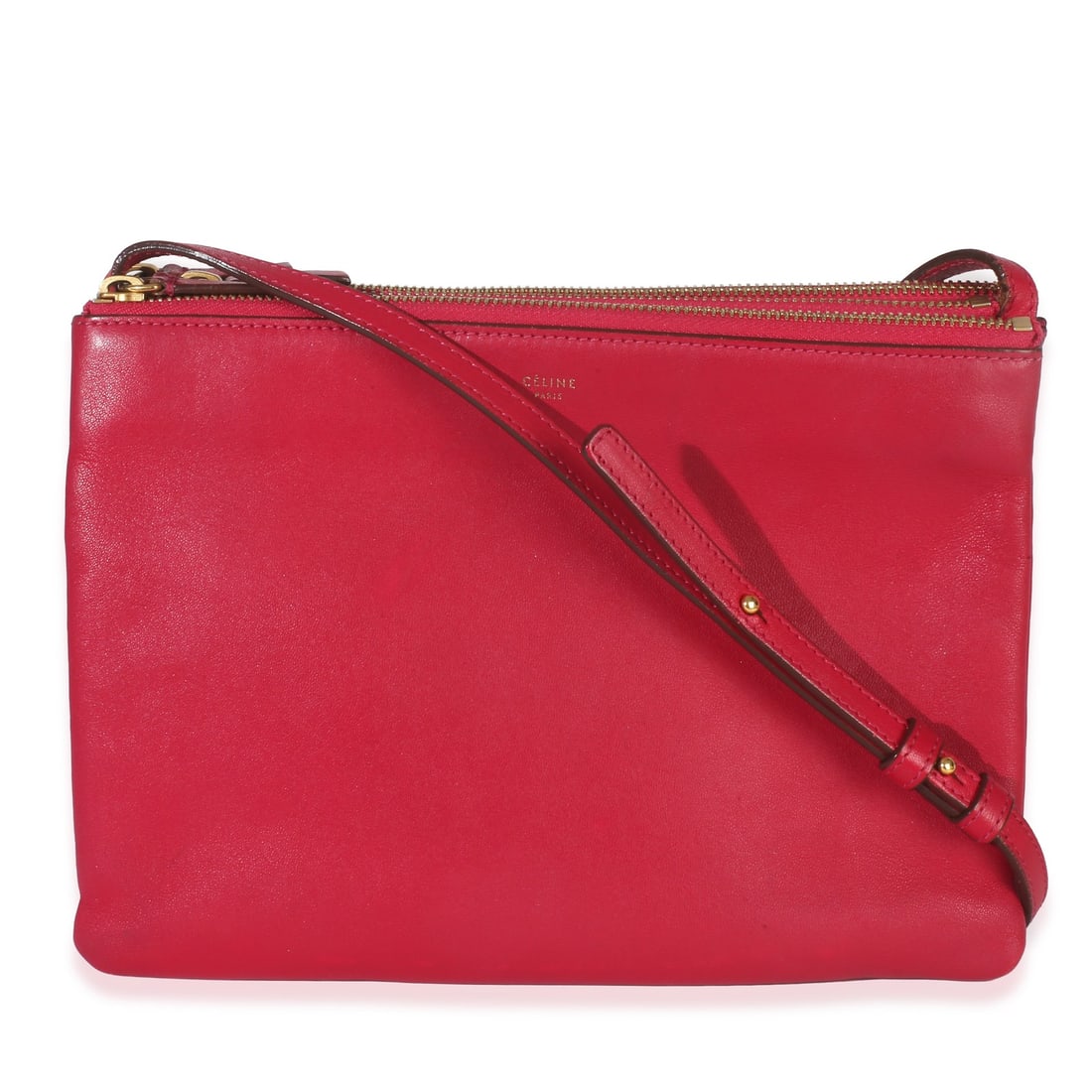 Celine Large Trio Crossbody Bag in Fuchsia Lambskin Leather: Celine Large Trio Crossbody Bag in Fuchsia Lambskin Leather This Celine Large Trio Crossbody bag is crafted from fuschia pink lambskin leather and features a versatile design that can be worn as a cro