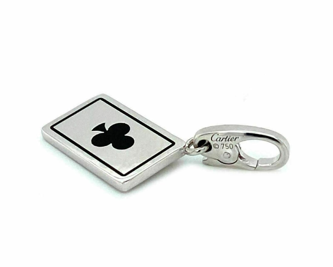 Cartier Club Charm Pendant 18k White Gold Black Enamel: Cartier Club Charm Pendant 18k White Gold Black Enamel This authentic Cartier Playing Card Club charm pendant is crafted from solid 18k white gold and features a striking black enamel club motif inspi