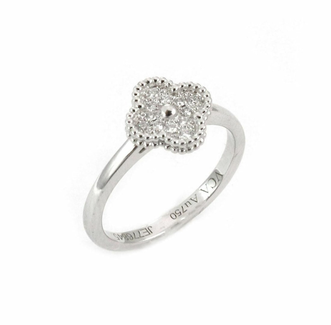 Van Cleef Arpels Sweet Alhambra 18k White Gold Diamond Ring Size 5: Van Cleef Arpels Sweet Alhambra 18k White Gold Diamond Ring Size 5 This authentic Van Cleef & Arpels Sweet Alhambra ring is expertly crafted in 18k white gold and showcases the iconic four-leaf clover