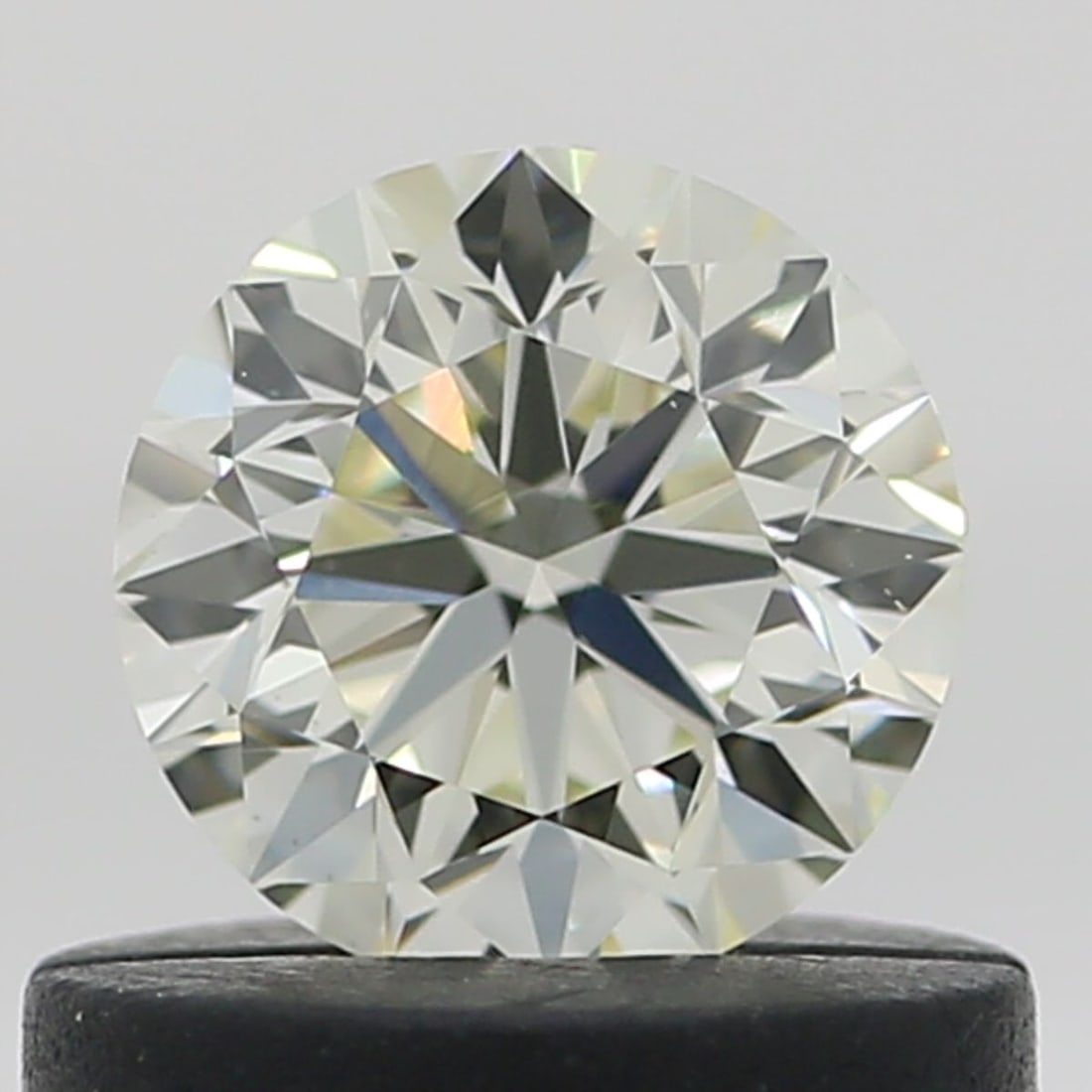 Loose Diamond - ROUND 0.51ct O-P VS1: Loose Diamond - ROUND 0.51ct O-P VS1 Source: Natural Shape: ROUND Carats: 0.51 Color: O-P Certification: NONE Video: