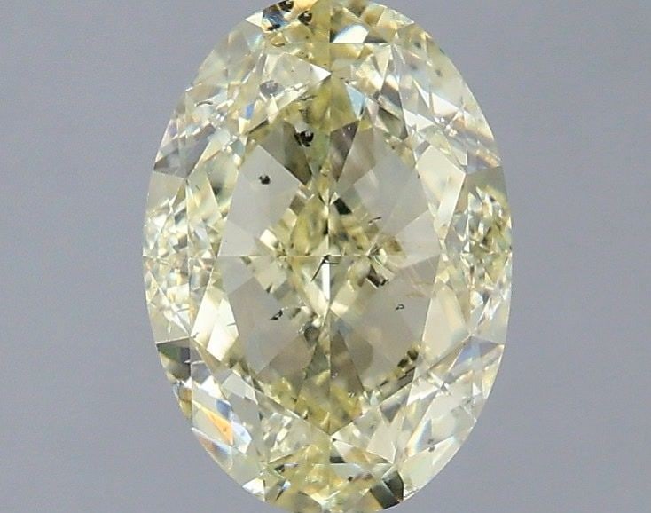 Loose Diamond - OVAL 2.0ct Fancy Light Yellow SI2: Loose Diamond - OVAL 2.0ct Fancy Light Yellow SI2 Source: Natural Shape: OVAL Carats: 2.0 Color: Fancy Light Yellow Certification: GIA Video: