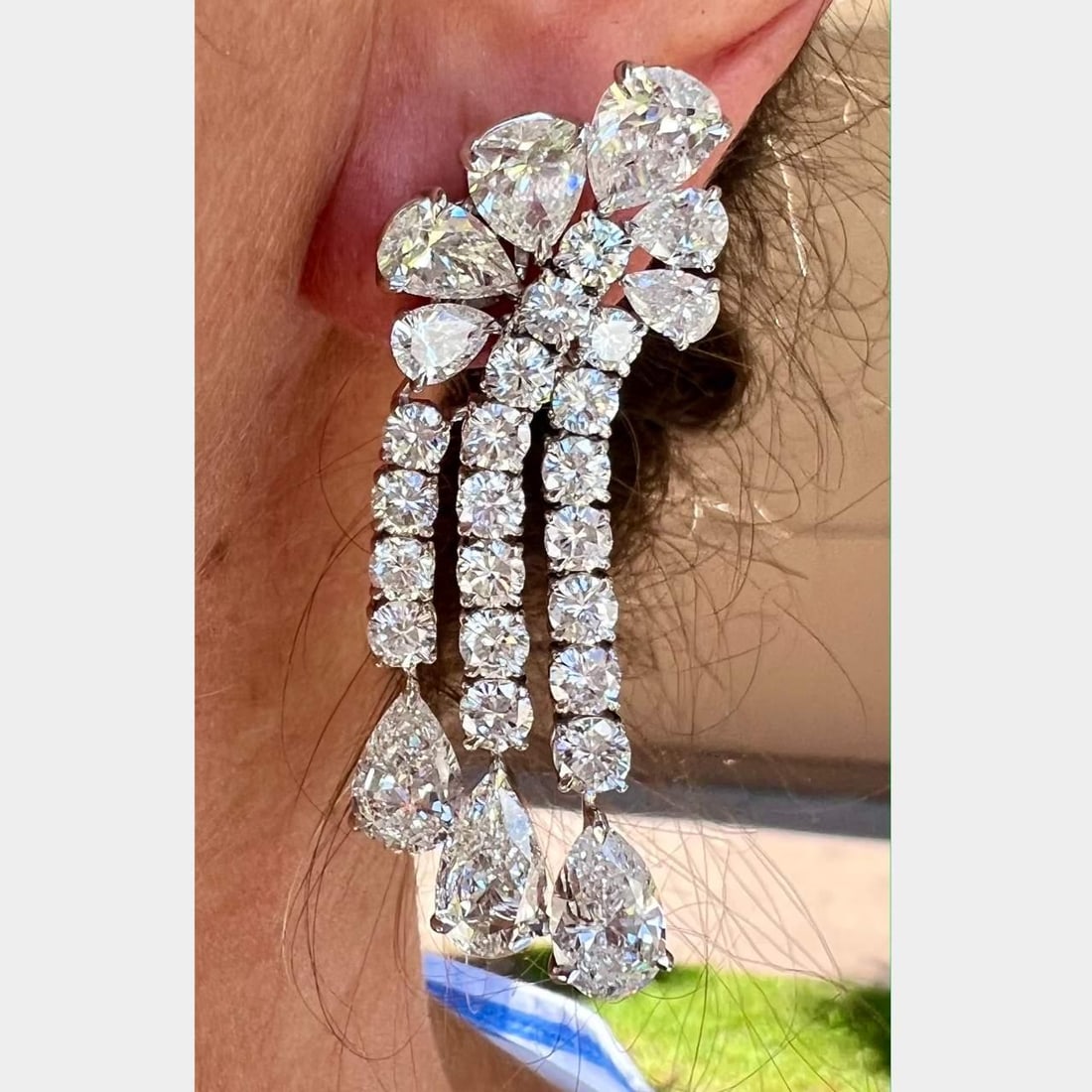 Platinum 30.00 Ct Diamond Earrings E-F Color VS1-SI2 Clarity 2.25 Inches: Platinum 30.00 Ct Diamond Earrings E-F Color VS1-SI2 Clarity 2.25 Inches Stylish and elegant, these Platinum Diamond Earrings feature a total diamond weight of 30.00 Ct. The earrings are set with 38 d