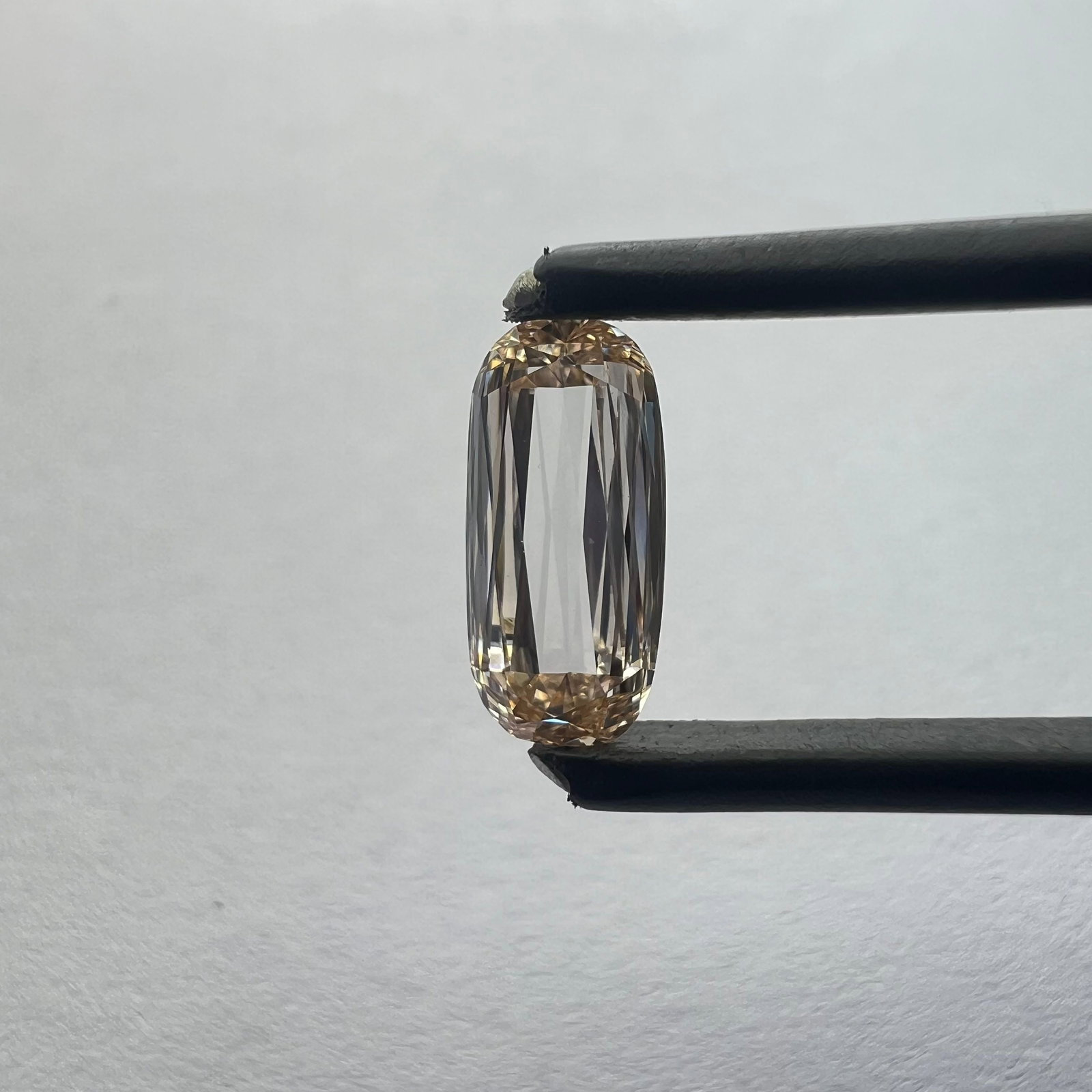 Loose Diamond - OTHER 0.98ct Champagne VS1: Loose Diamond - OTHER 0.98ct Champagne VS1 Source: This is a real non-mined Diamond that has been grown in a lab Shape: OTHER Carats: 0.98 Color: Champagne Certification: NONE PLEASE NOTE: Framed, Lar