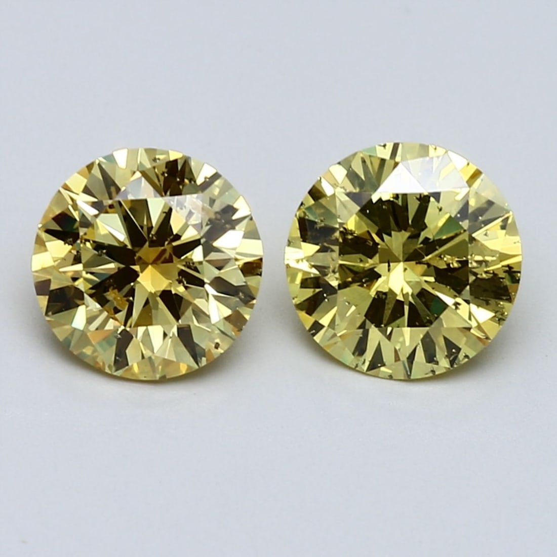 Loose Diamond - ROUND 1.51ct Fancy Vivid Yellow I1: Loose Diamond - ROUND 1.51ct Fancy Vivid Yellow I1 Source: Natural Shape: ROUND Carats: 1.51 Color: Fancy Vivid Yellow Certification: GIA Video: