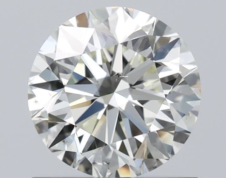 Loose Diamond - ROUND 0.92ct L SI1: Loose Diamond - ROUND 0.92ct L SI1 Source: Natural Shape: ROUND Carats: 0.92 Color: L Clarity: SI1 Certification: GIA Video:
