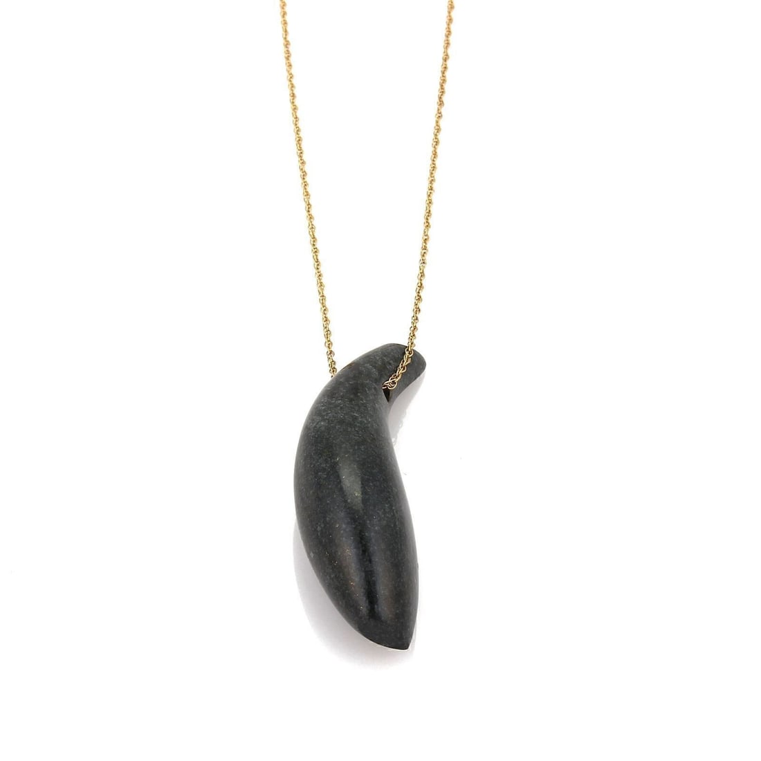 Tiffany Gehry jade fish pendant necklace 18k yellow gold: Tiffany Gehry jade fish pendant necklace 18k yellow gold This Tiffany & Co. necklace, designed by Frank Gehry, features a sculpted jade fish pendant crafted in 18k yellow gold. The necklace showcases 