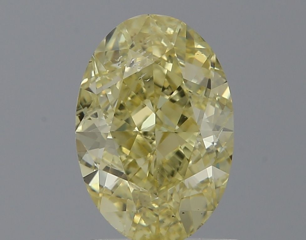 Loose Diamond - OVAL 1.7ct Fancy Yellow SI2: Loose Diamond - OVAL 1.7ct Fancy Yellow SI2 Source: Natural Shape: OVAL Carats: 1.7 Color: Fancy Yellow Certification: GIA Video: