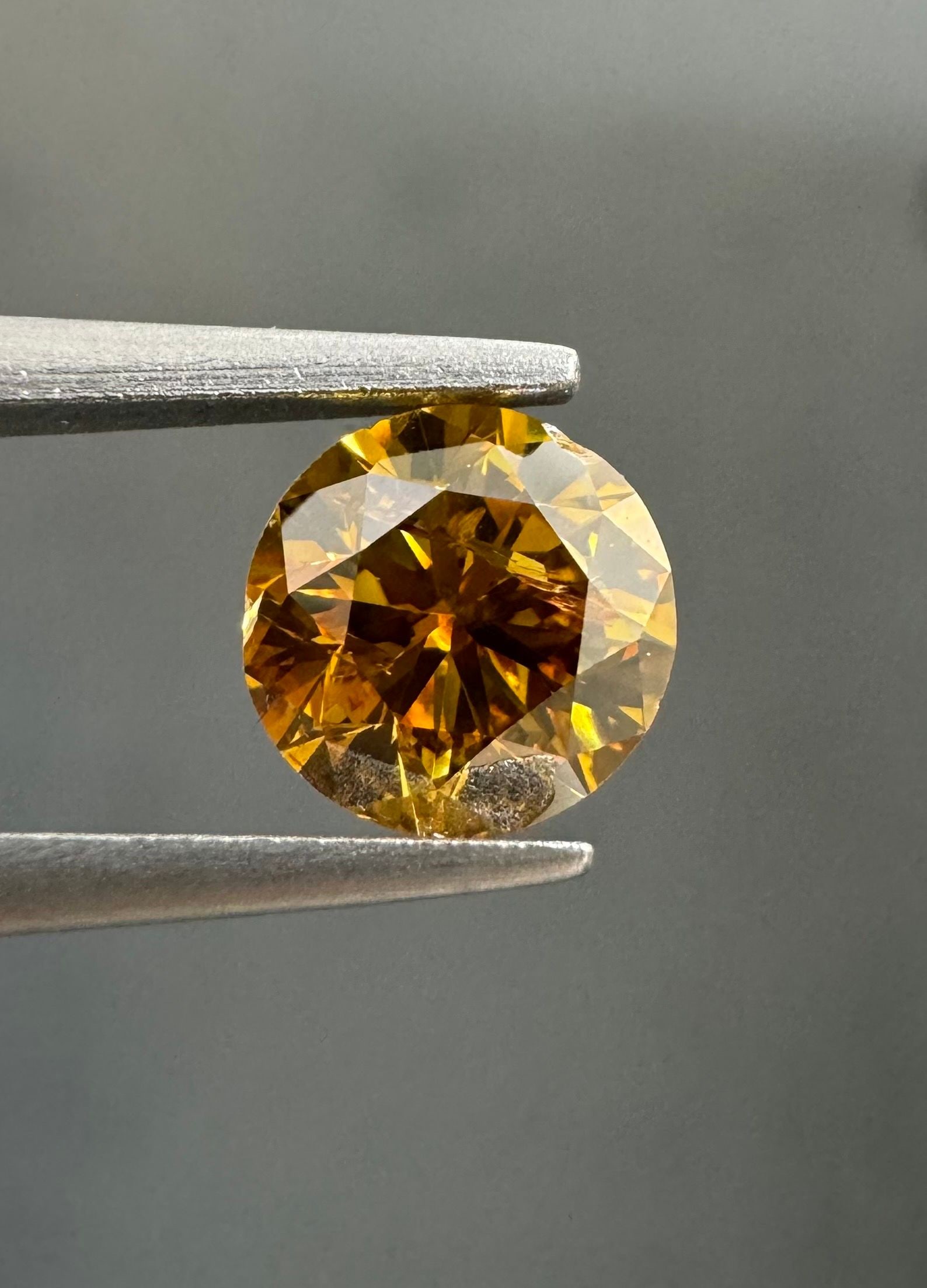 Loose Diamond - ROUND 0.74ct Fancy Deep Brown Yellow I2: Loose Diamond - ROUND 0.74ct Fancy Deep Brown Yellow I2 Source: Natural Shape: ROUND Carats: 0.74 Color: Fancy Deep Brown Yellow Certification: GIA Video: Video Link PLEASE NOTE: Framed, Large, or
