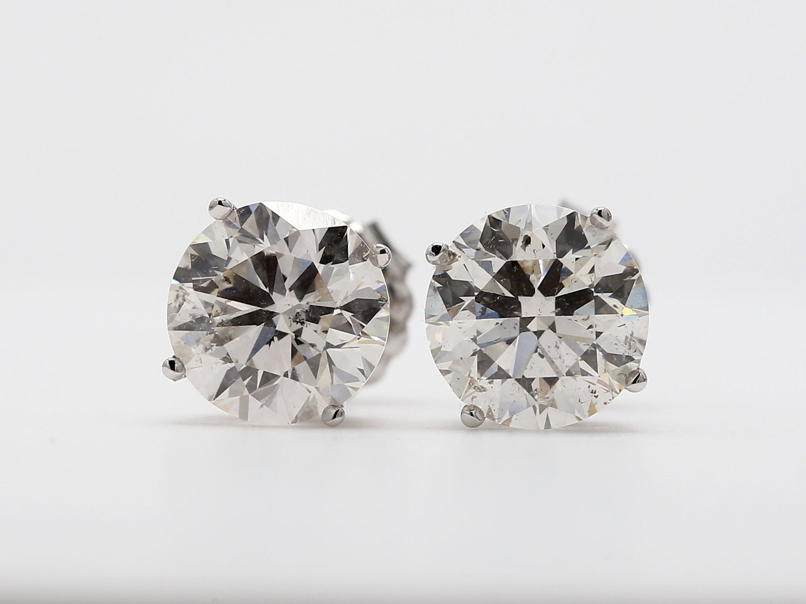 Loose Diamond - ROUND 2.03ct J SI1: Loose Diamond - ROUND 2.03ct J SI1 Source: Natural Shape: ROUND Carats: 2.03 Color: J Clarity: SI1 Certification: NONE Video: