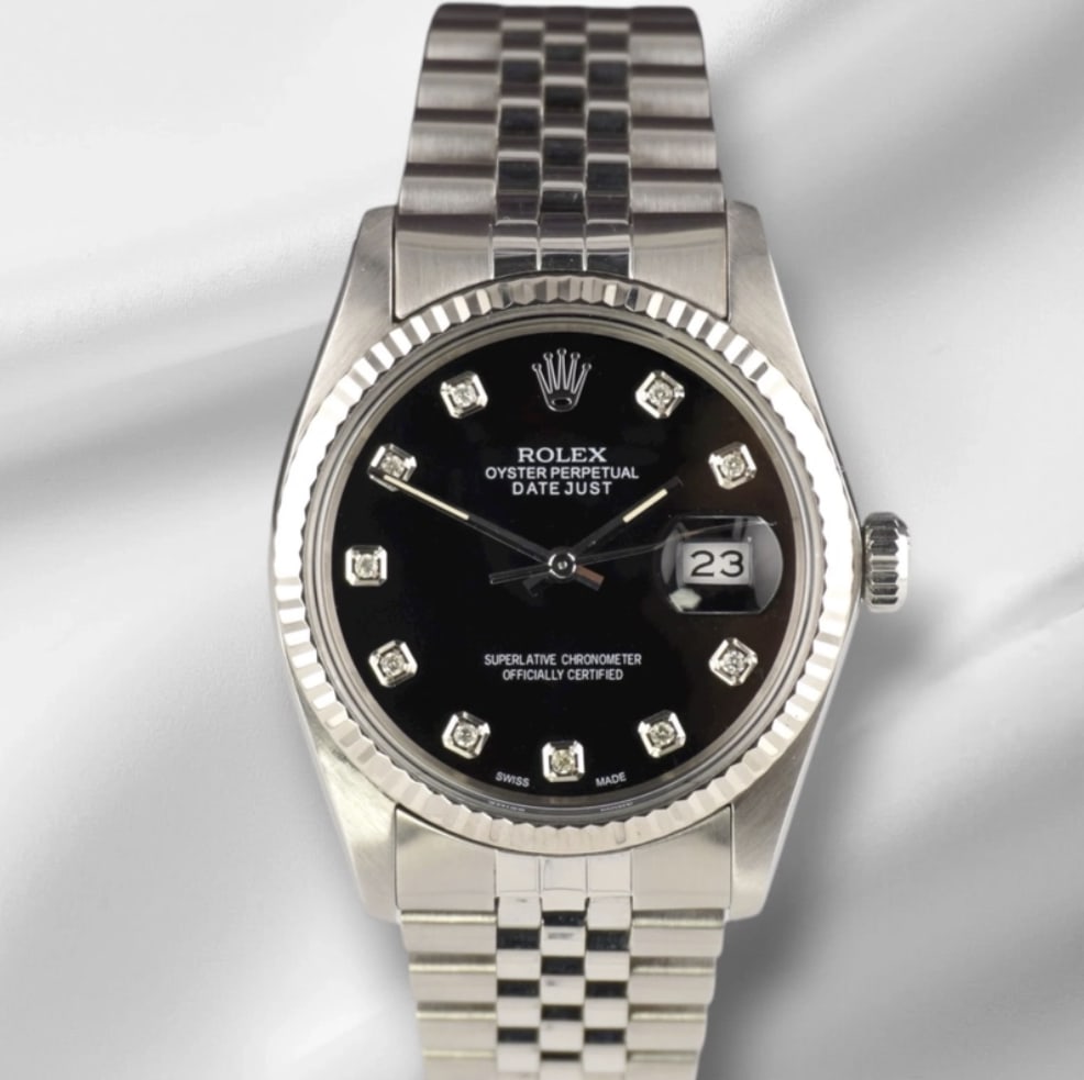 Rolex Datejust aftermarket ice blue diamond dial Jubilee bracelet Ref 16014: Rolex Datejust aftermarket ice blue diamond dial Jubilee bracelet Ref 16014 This is a Rolex Datejust men's watch featuring an Aftermarket ice blue diamond dial, complemented by a fluted bezel and a D-