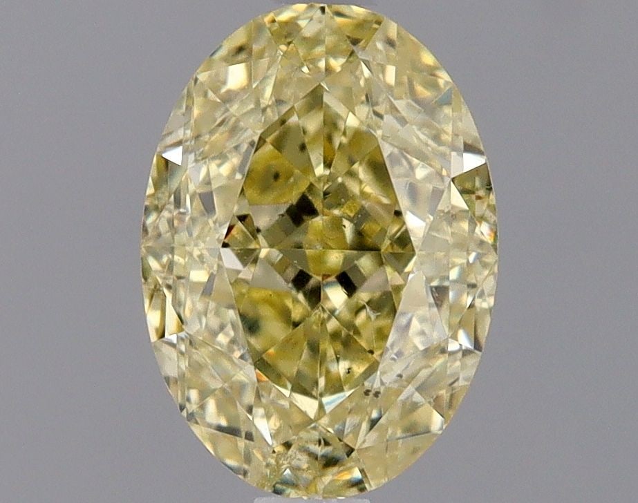 Loose Diamond - OVAL 1.02ct Fancy Light Yellow SI2: Loose Diamond - OVAL 1.02ct Fancy Light Yellow SI2 Source: Natural Shape: OVAL Carats: 1.02 Color: Fancy Light Yellow Certification: GIA Video: