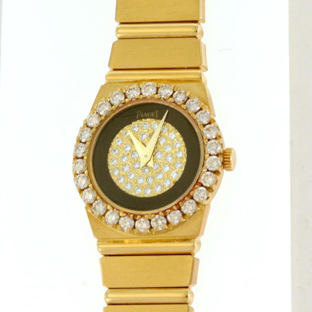 Piaget Polo 18k Yellow Gold Diamond Ladies Watch 435730: Piaget Polo 18k Yellow Gold Diamond Ladies Watch 435730 This exquisite Piaget Polo ladies wristwatch showcases a stunning 18k yellow gold design. The elegant 21mm round case features a diamond-encrust