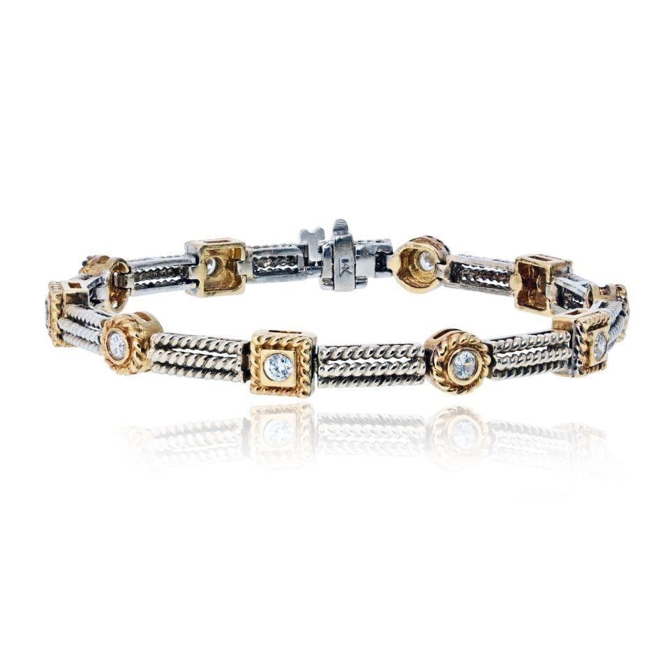 14K Two Tone Diamond Bracelet 1.06 cttw 7 inch: 14K Two Tone Diamond Bracelet 1.06 cttw 7 inch This pre-owned bracelet features a sophisticated two tone 14K gold design and is set with approximately 1.06 carats of round diamonds. Measuring 7 inches