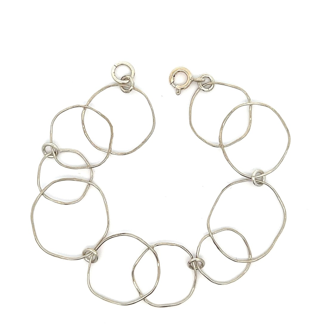Handmade Sterling Silver Open Circles Link Bracelet 7 Inches: Handmade Sterling Silver Open Circles Link Bracelet 7 Inches This exquisite Handmade Sterling Silver Interlocking Organic Open Circles Link Bracelet showcases a unique chain design that features inter