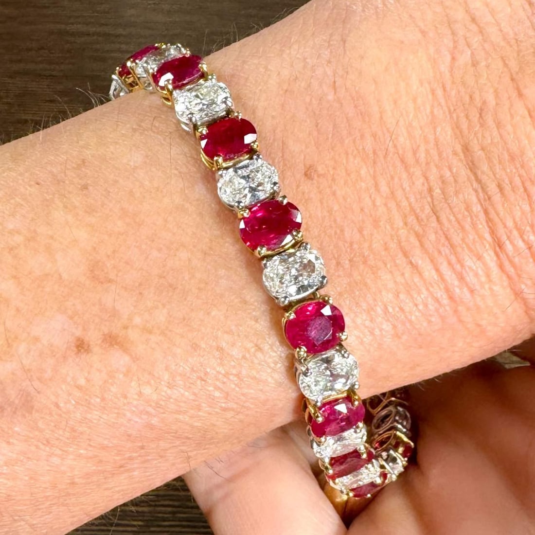 GIA Certified Burma Ruby Diamond Bracelet in Platinum and 18K Gold: GIA Certified Burma Ruby Diamond Bracelet in Platinum and 18K Gold This stunning bracelet showcases a luxurious combination of GIA Certified Burma rubies and diamonds, set in a blend of platinum and 1