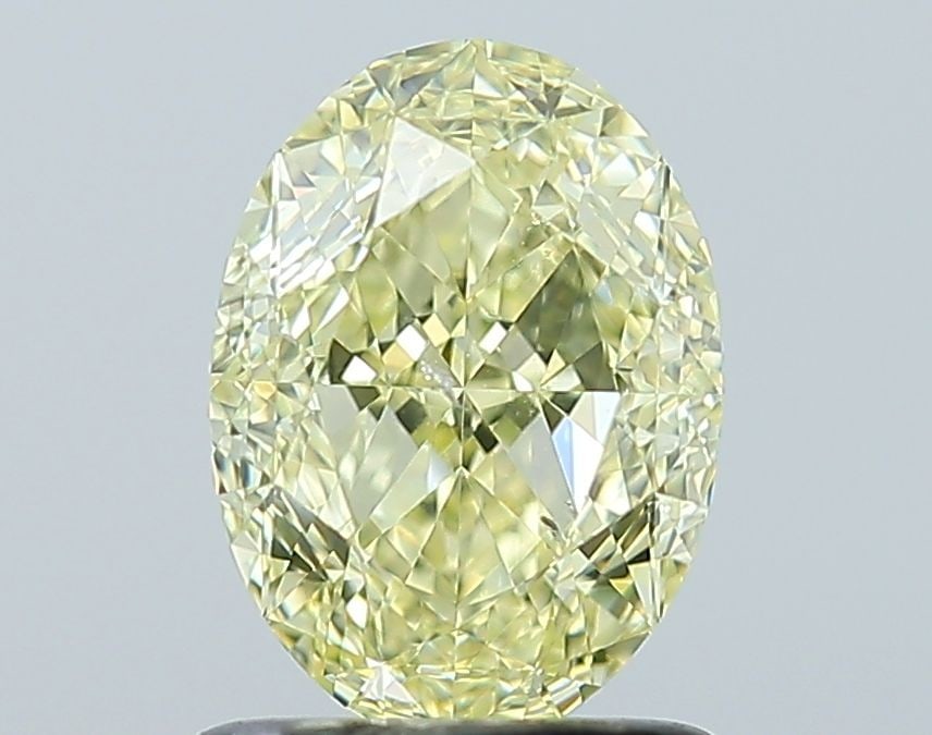 Loose Diamond - OVAL 1.4ct Fancy Yellow SI2: Loose Diamond - OVAL 1.4ct Fancy Yellow SI2 Source: Natural Shape: OVAL Carats: 1.4 Color: Fancy Yellow Certification: GIA Video: