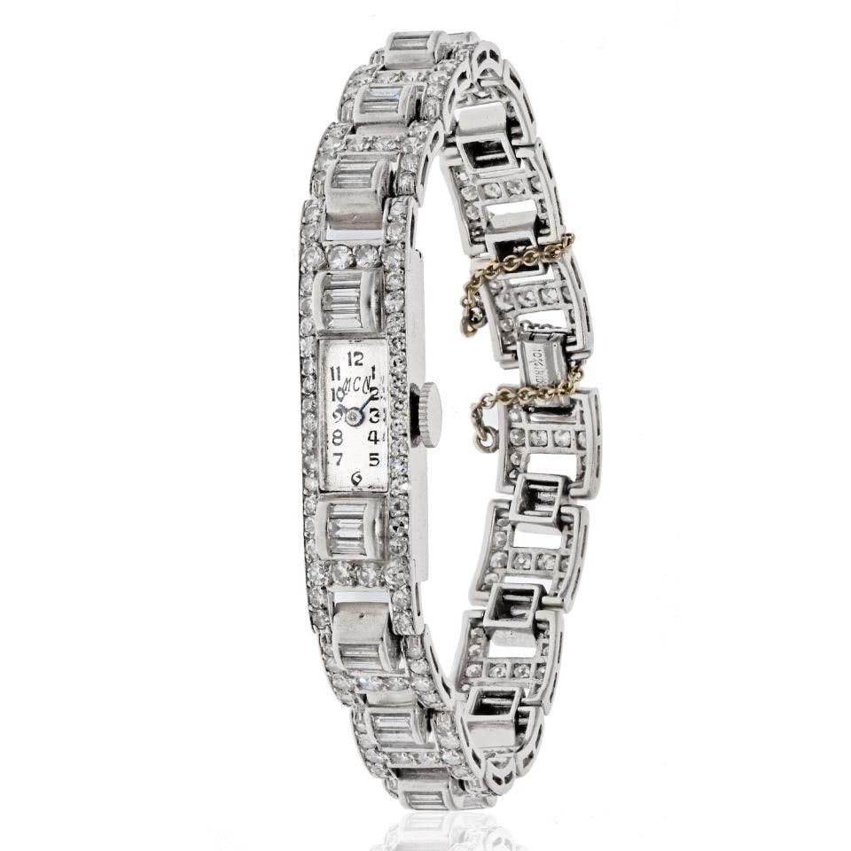 Platinum Vintage Ladies Watch 6 Carat Diamond Baguette Round Cut: Platinum Vintage Ladies Watch 6 Carat Diamond Baguette Round Cut This exquisite vintage ladies' watch is crafted from luxurious platinum and adorned with both baguette and round cut diamonds, totaling